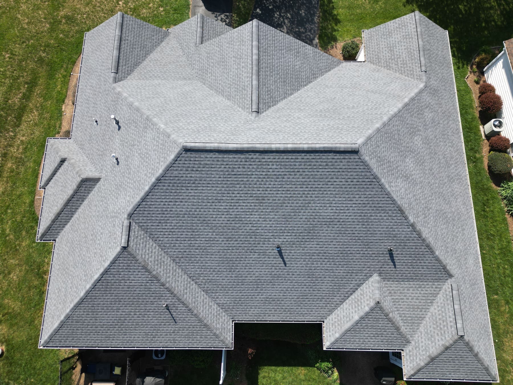 A beautiful home with a substantial shingle roof
