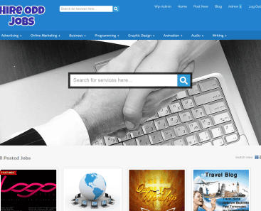 Hand typing on a keyboard representing odd jobs and freelance work.