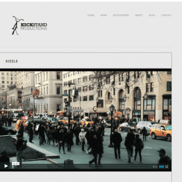 City street scene with pedestrians and vehicles in Kansas City.